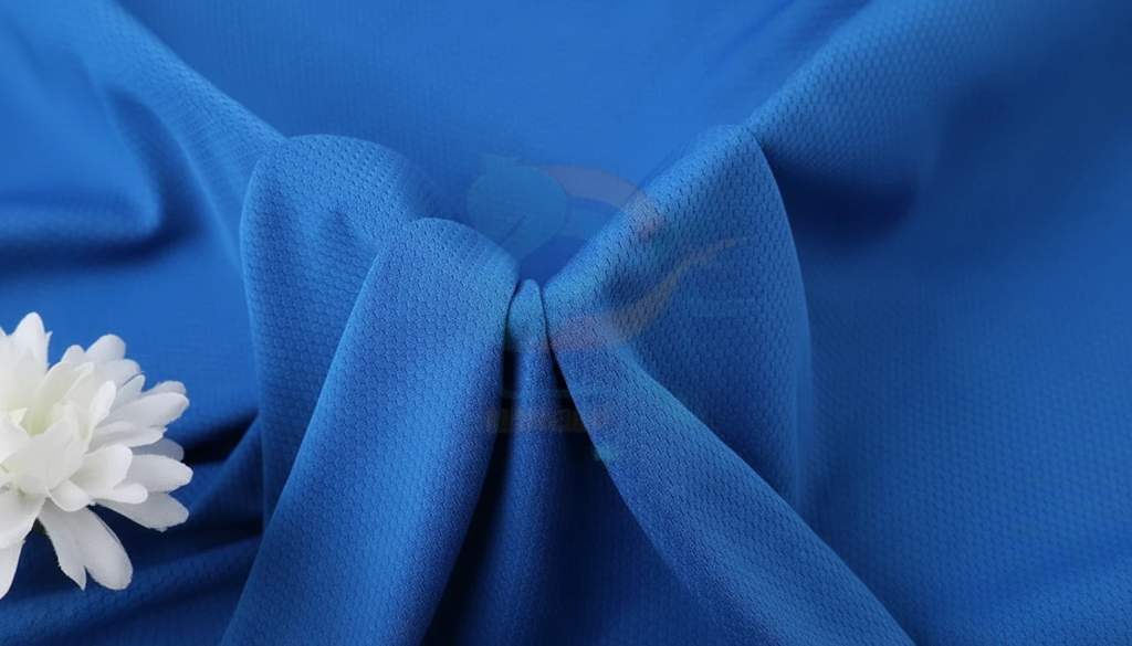 پارچه فلامنت ورزشی کندویی آبی شالی